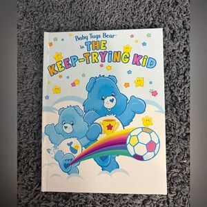 NWT Care Bears Baby Tugs Bear in The Keep Trying Kid, written by, David Polter